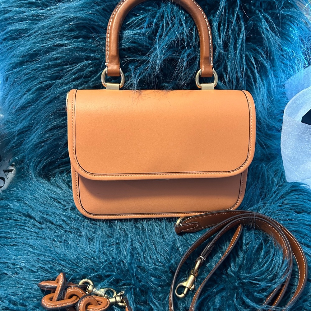Coach top handle Rogue comes with dust bag